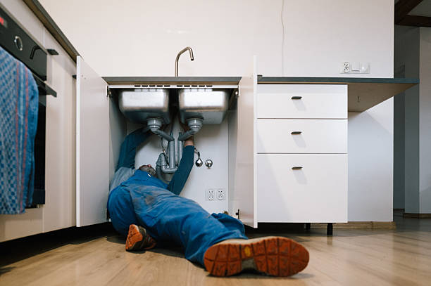 Professional Emergency Plumber technician working in Caldwell, ID